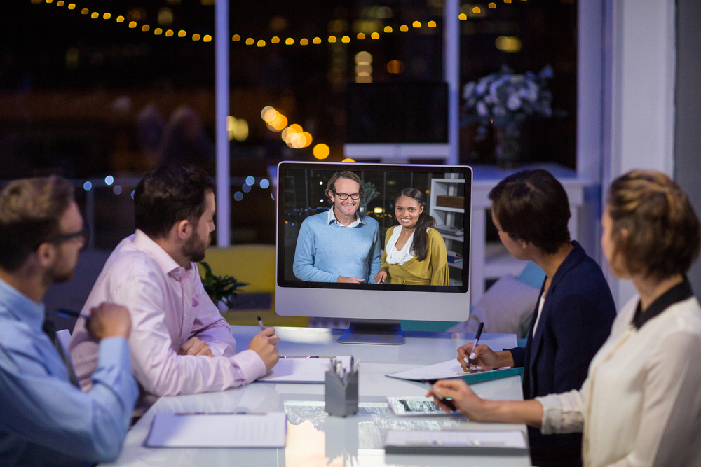 Business team having video conference in conference room at office