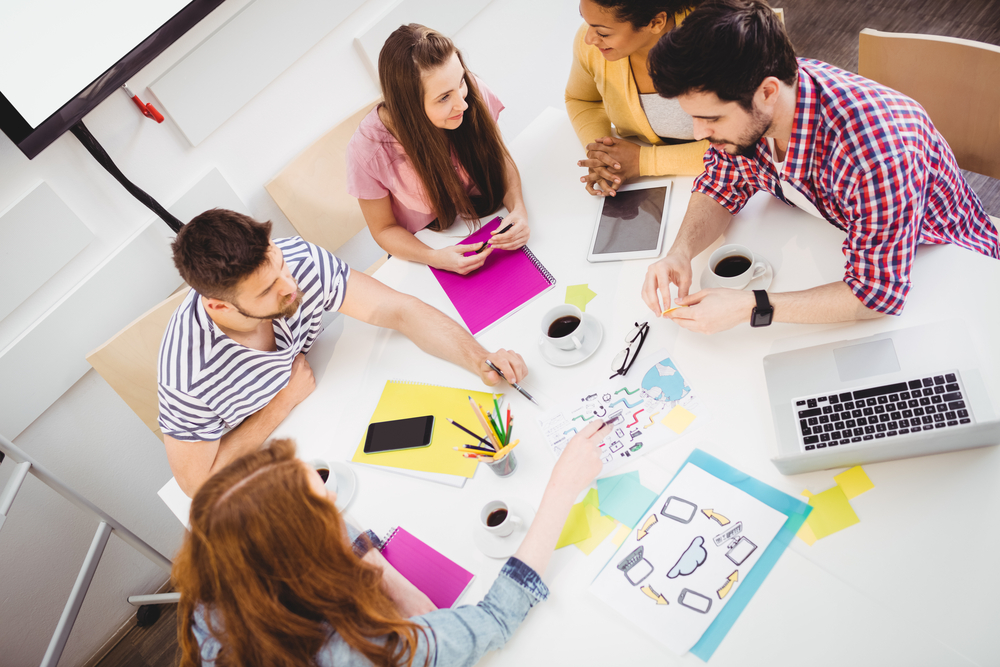 A group of young businesspeople working in an office