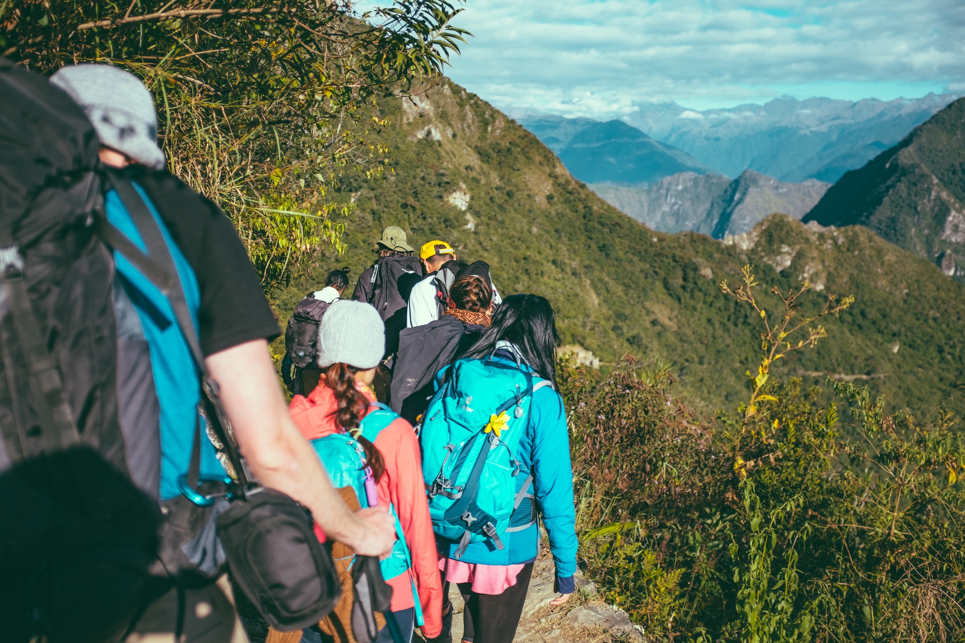 outward bound adventure - a group of 7 people climbing a mountain