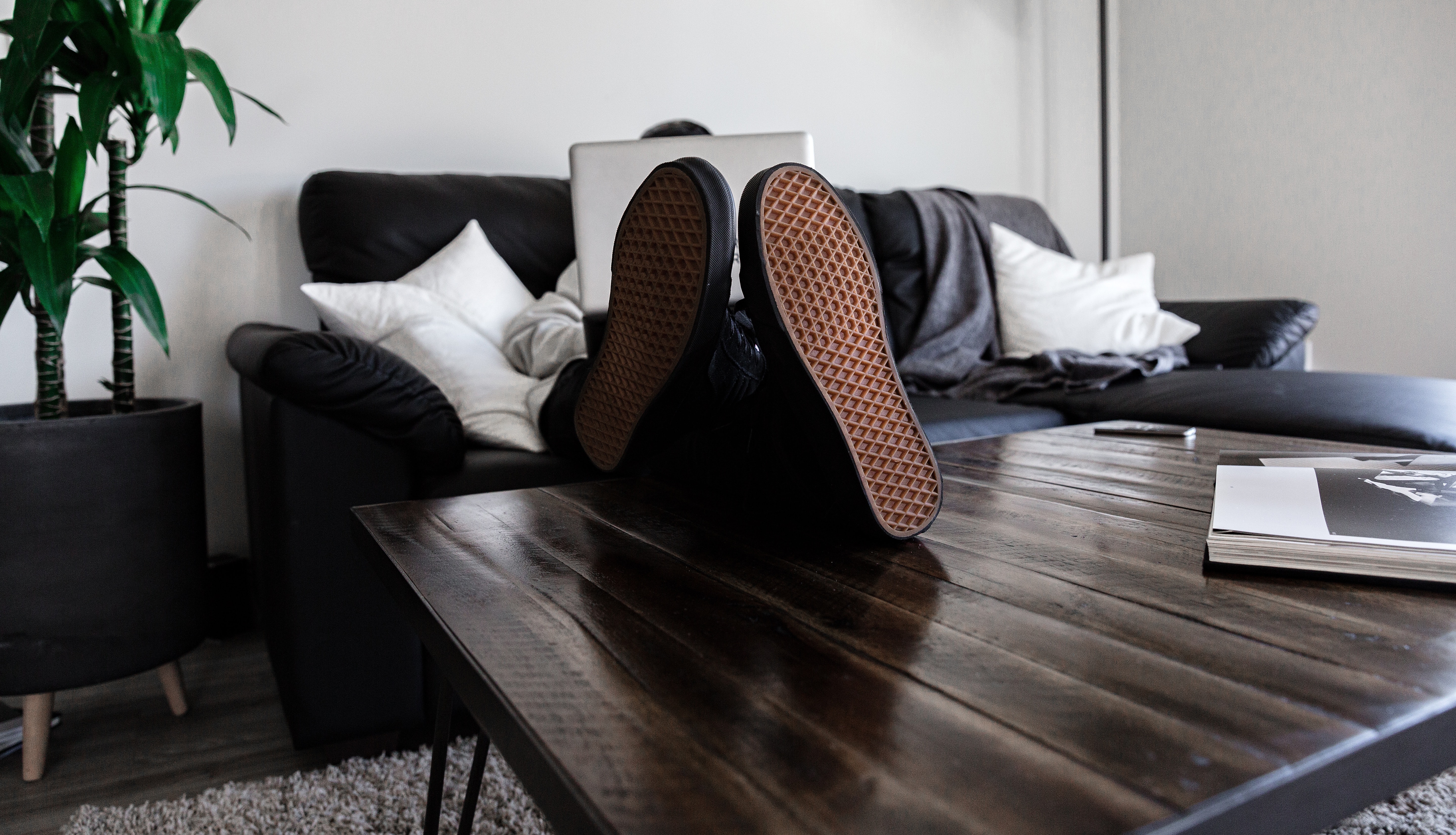 Man relaxing in home office. Photo by Dillon Shook.