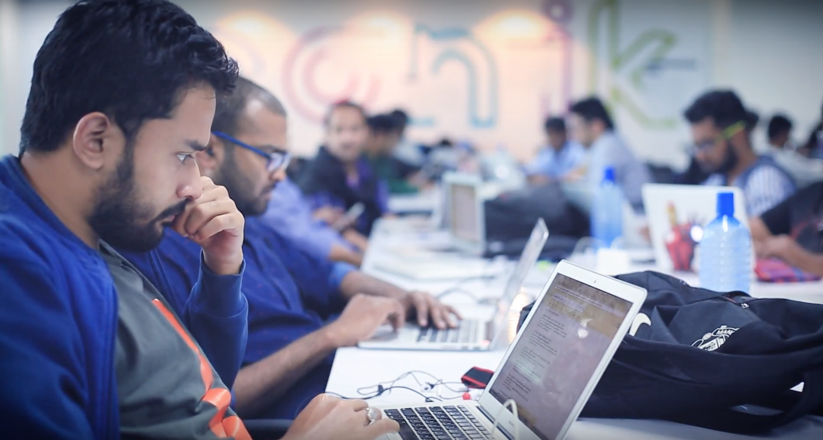 Voonik employees working at their laptops